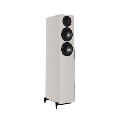 White floor-standing speaker with black cones on a white background